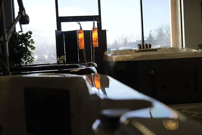 Hot tubs on display inside a Regency Hot Tubs showroom